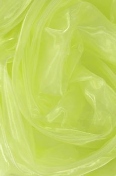 15-055 Sárgás zöld fényes organza 150cm