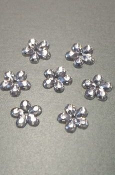 18-143 Ezüst színű felvarrható dísz 50db