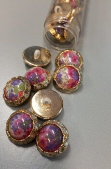 01-123 Arany-virágos műanyag gomb